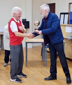 Eddie Mulholland (Watergrasshill) receiving the Frances Cody Trophy from Garreth Cody