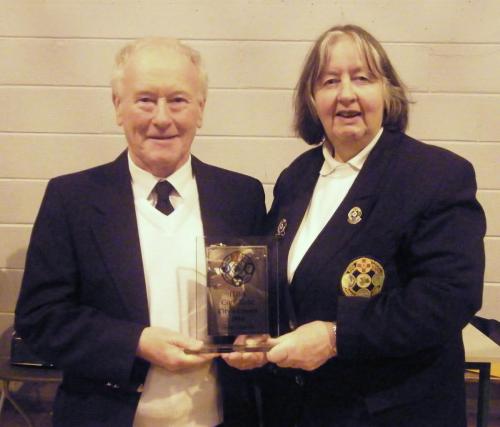 Zone Convenor Hazel Foley presenting Tom Liston City Mens Captain with runners up Trophy