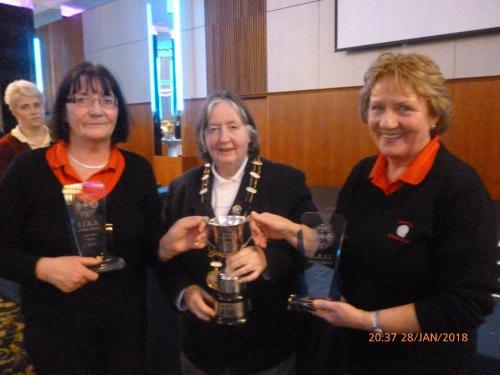Kathleen O'Reilly & Liz Butler Midleton winners Ladies Pairs receiving cup from Zone Convener Hazel Foley