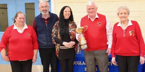 Liam Conlon Watergrasshill receiving the May Murray Cup from Michael & Gillian Murray