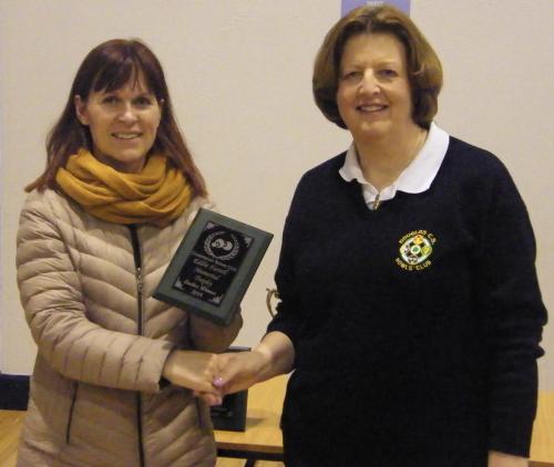 Sheila O'Driscoll ( DCS ) Winner of Crosshaven Ladies Singles being presented the Eddie Farrell Memorial Trophy by Lelia Farrell