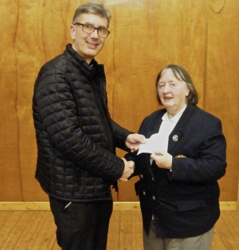 Hazel Foley presenting cheque to Nigel Dunne (Dean of Cork)