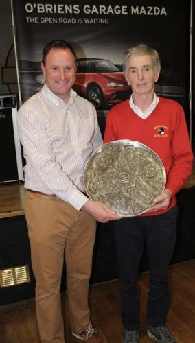 Sean O'Riordan (Watergrasshill) receiving Division 1 Winners Shield from Roy Corbett, O'Briens Garage