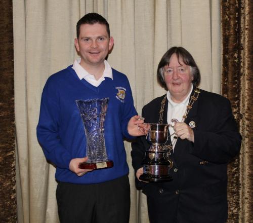 Conor Middleton Crosshaven National Singles Winner receiving cup from Hazel Foley